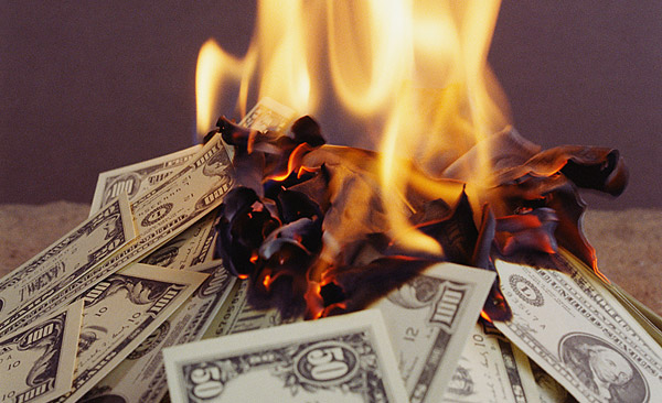 burning-wasting-money-600